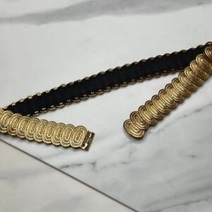 90s  Vintage gold tone stretch belt, 94 GRD shiny textured disc metal cincher